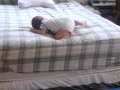 8 month old baby climbs off the bed