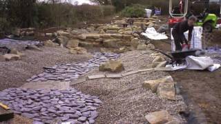 placing pebbles, cobbles and boulders