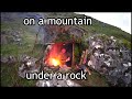 Rainy night camping under a rock in Ireland