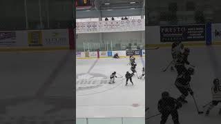 Lauren Bolger - back check forcing an offside (white #16)