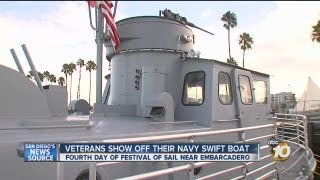 Veterans show off their Navy Swift Boat during Festival of Sail