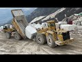 caterpillar 992d wheel loader loading marble blocks on caterpillar dumpers birros marble quarries