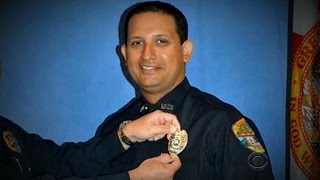 Cop arrested for killing Florida man waiting for tow truck