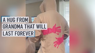 Family paints a hug from grandma on sweaters