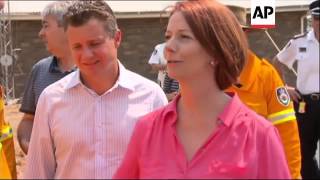 Australian PM Gillard tours areas affected by wildfires