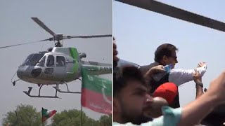 Pakistan ousted PM Imran Khan lands heli on highway ahead of rally | AFP