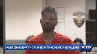 Man charged with DUI after crashing into Louisville restaurant
