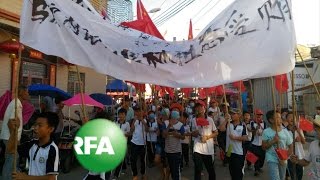 Thousands March in Wukan to Protest Village Chief’s Arrest