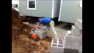 Mobile Home Re-Leveling Using The Duraskirt Retrofit Cart \u0026 Block Carrier Insert