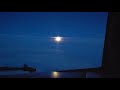 Flight attendant life- Cockpit night view. Full moon. Boeing 737-500