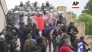 Greek protesters clash with police over name deal