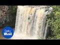 Australian daredevil plunges over waterfall in kayak - Daily Mail