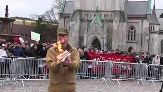 You can see the person burning the quran in Norway
