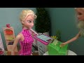 Elsa and Anna toddlers buy school supplies from store - Barbie is seller