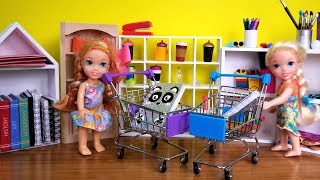 Elsa and Anna toddlers buy school supplies from store - Barbie is seller