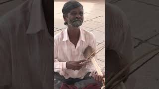 Babu playing ichakki outside lalit mahal palace ! Then and now .. still goes on !