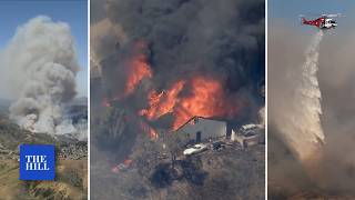 WATCH: Wildfires sweep across Southern California communities, ravage thousands of acres