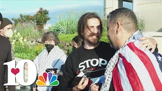 Protesters speak after being released from custody following UT arrest