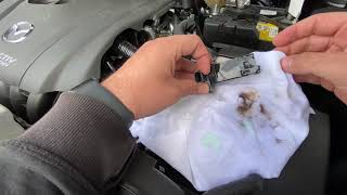 Car engine air mass meter (air mass meter, LMM) clean with air mass sensor cleaner Mazda CX-5