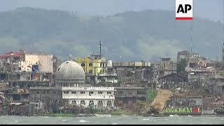 ONLY ON AP Damage visible in Marawi, after city declared liberated