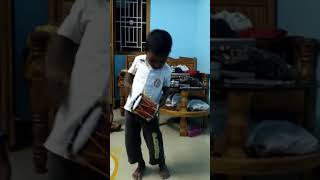 Little boy play drums