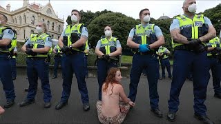 Clashes and arrests as New Zealand police clear Covid protest.