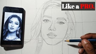 how  to draw a face using grid method easily from mobile .