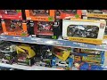 diecast peg hunting at toys r us. the tomica ferrari cabinet new casting for welly speed city.