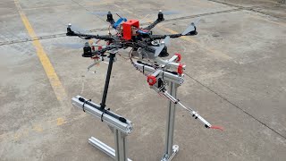 Drone equipped with robotic arm