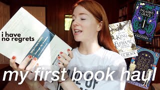 my first big book haul, bookshelf tour, and finding a new favorite fantasy romance standalone