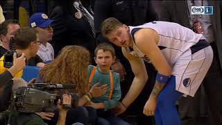 Luka Doncic autographs jersey for young fan after collision in game at Golden State