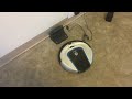 the hoover quest700 robotic vacuum finds its docking station