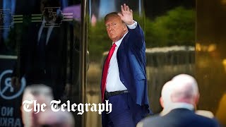 Donald Trump greeted in New York ahead of historic court appearance