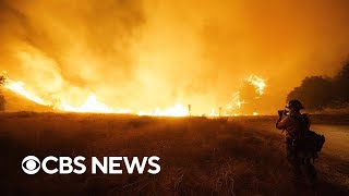 Strong winds fan new Southern California fires