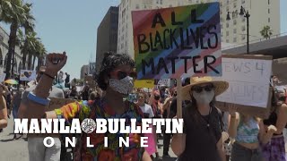 Gay Pride parade meets Black Lives Matter movement in Los Angeles