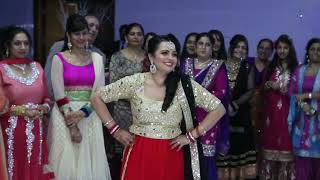 Girl rocks the dance floor! The Best Sikh Punjabi Wedding Dance off ever at a Reception - VideoMagic