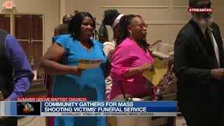 Community gathers for mass shooting victims' funeral service