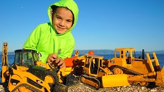 Construction Truck Toys at the Beach! | Diggers for Children | JackJackPlays