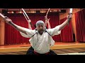 samurai 侍 artists showing off japanese sword skills stage performance by kamui japan