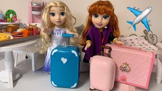 Elsa and Anna toddlers Packing for Vacation Disney Princess