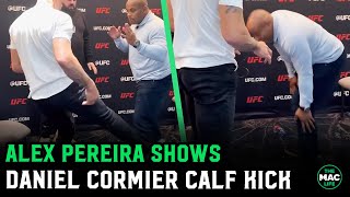 Alex Pereira shows Daniel Cormier his famous calf kick: 