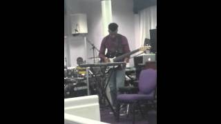 Young musician Warren Brown Jr playing drums,keys, bass same time