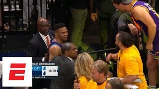 Russell Westbrook gets into it with Jazz fan coming off the floor for halftime | ESPN