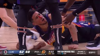 Devin Booker is down and bleeding pretty badly after colliding with Pat Beverley
