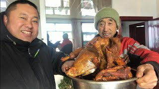 Smoke chicken in a large firewood cauldron in the countryside, eat meat and drink while it’s hot