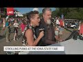 Strolling Piano brings music to the streets at the Iowa State Fair