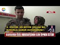 oğlunu kurtaran polisin ellerine sarıldı