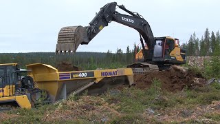 Volvo EC300EL | Loading a Komatsu HM400 with overburden in a quarry