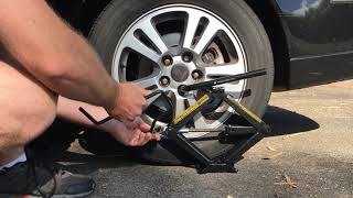 WATCH: How to use your car's scissor jack to break a stuck / frozen lug nut or b