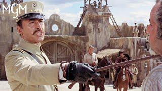 GUNS OF THE MAGNIFICENT SEVEN (1969) | Heads in the Sand | MGM